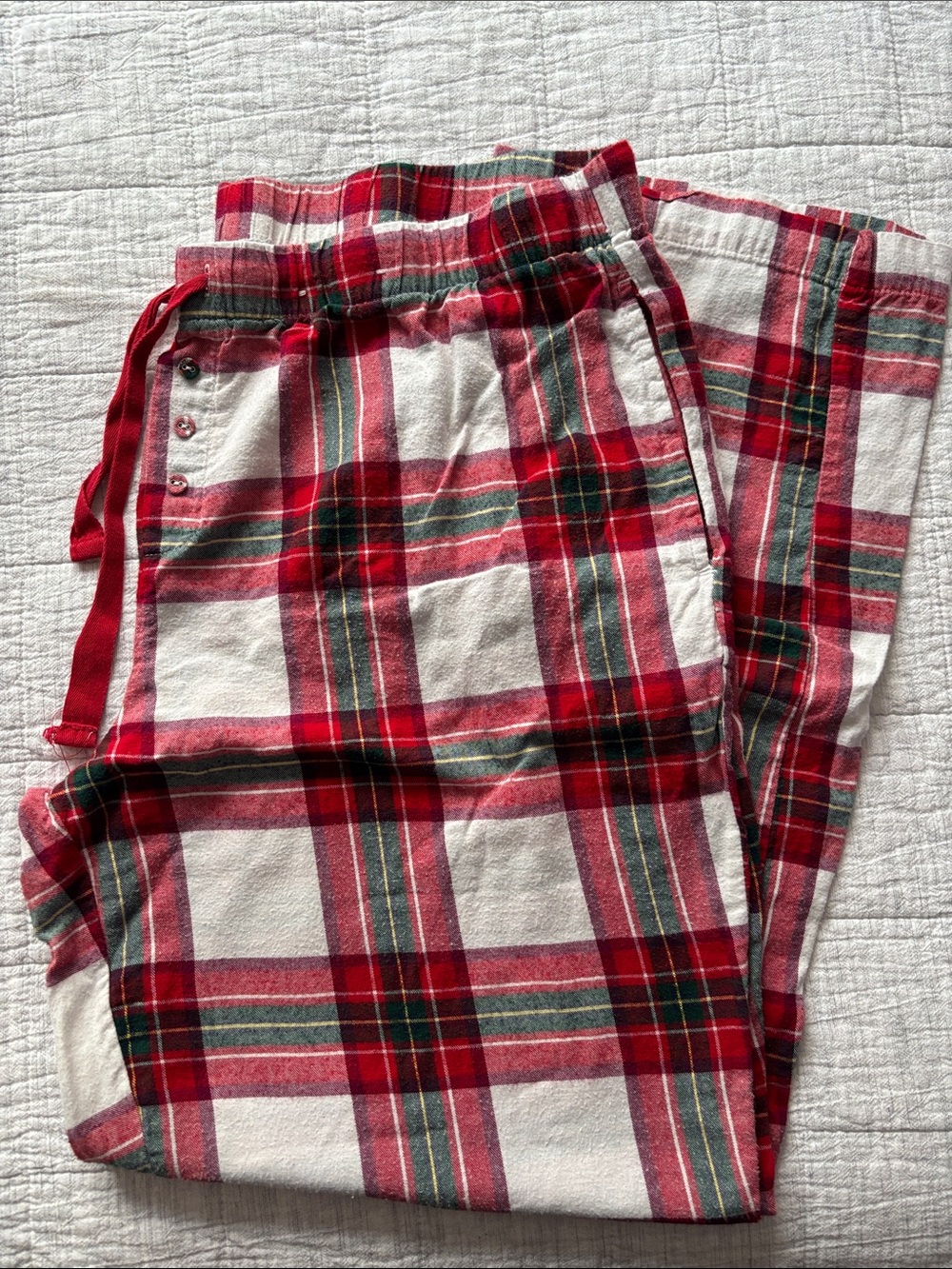 stars above Red, Green, and White Plaid Pajama Pants